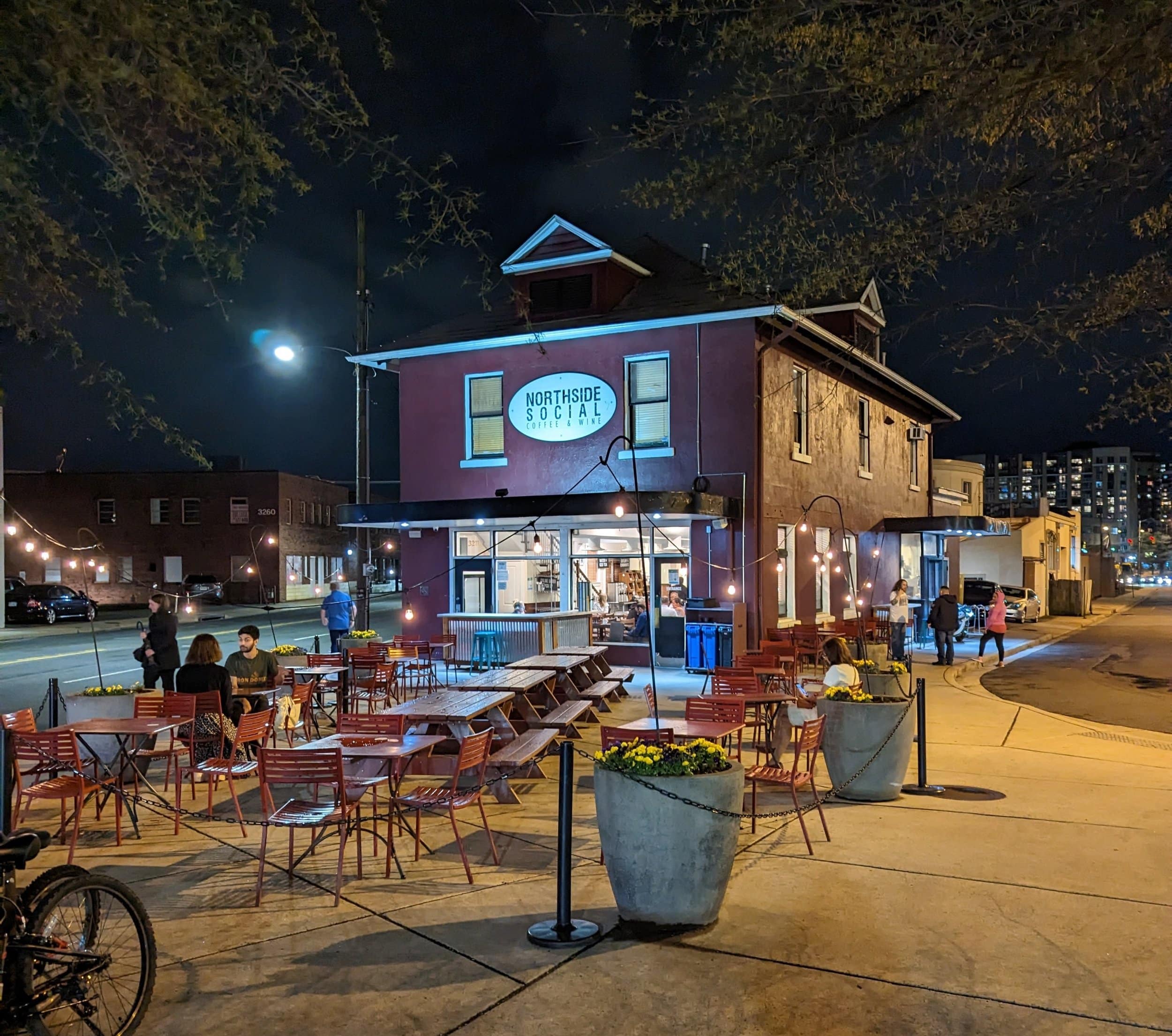 Nighttime photo of 3211 Wilson Blvd, circa 2023